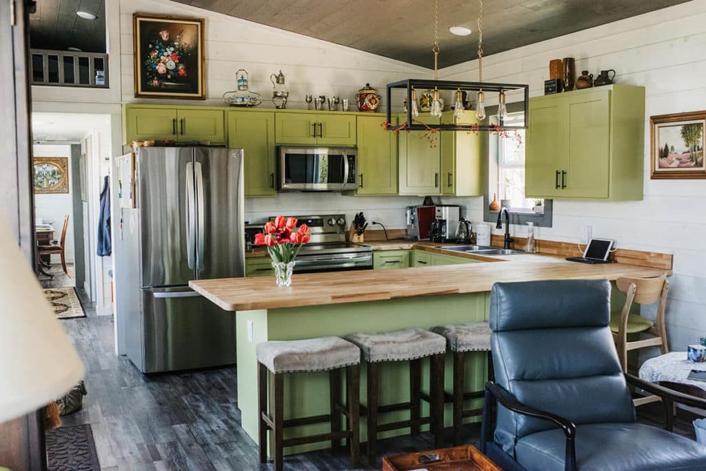 kitchen cabinets and wood countertops in prefab cabin