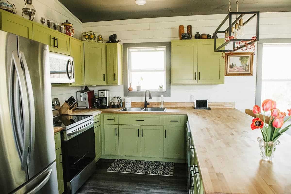 kitchen cabinets and wood countertops in prefab cabin