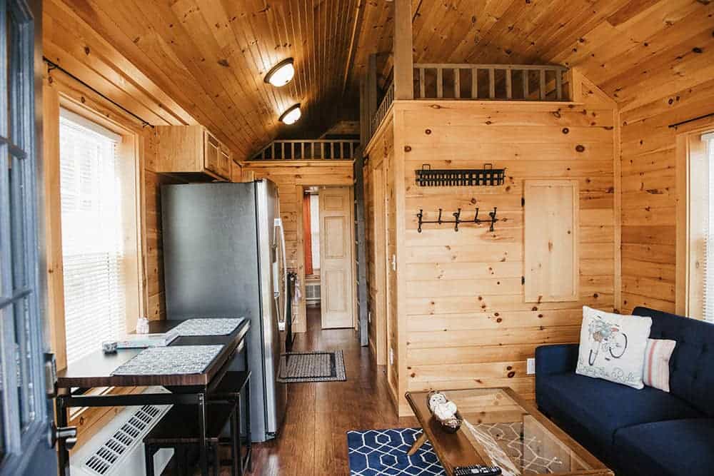 wooden walls in living space of prefab tiny cabin