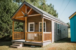modular log cabin with wood exterior and wood accents