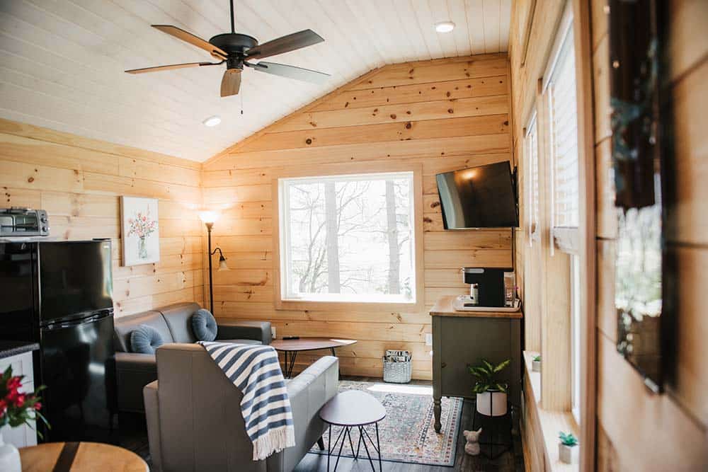 modern living space and wood interior of modular tiny home